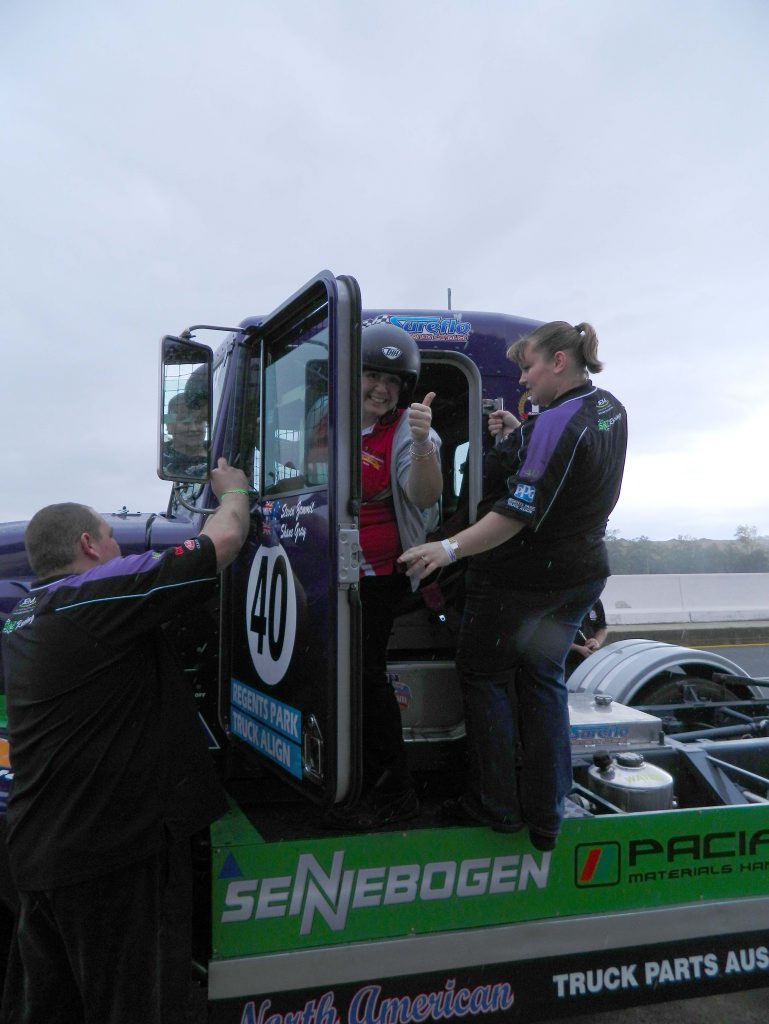 Big Rigs editor Carly Morrissey gets ready for the ride of her life in a racing truck. Big Rigs editor Carly Morrissey gets ready for the ride of her life in a racing truck.